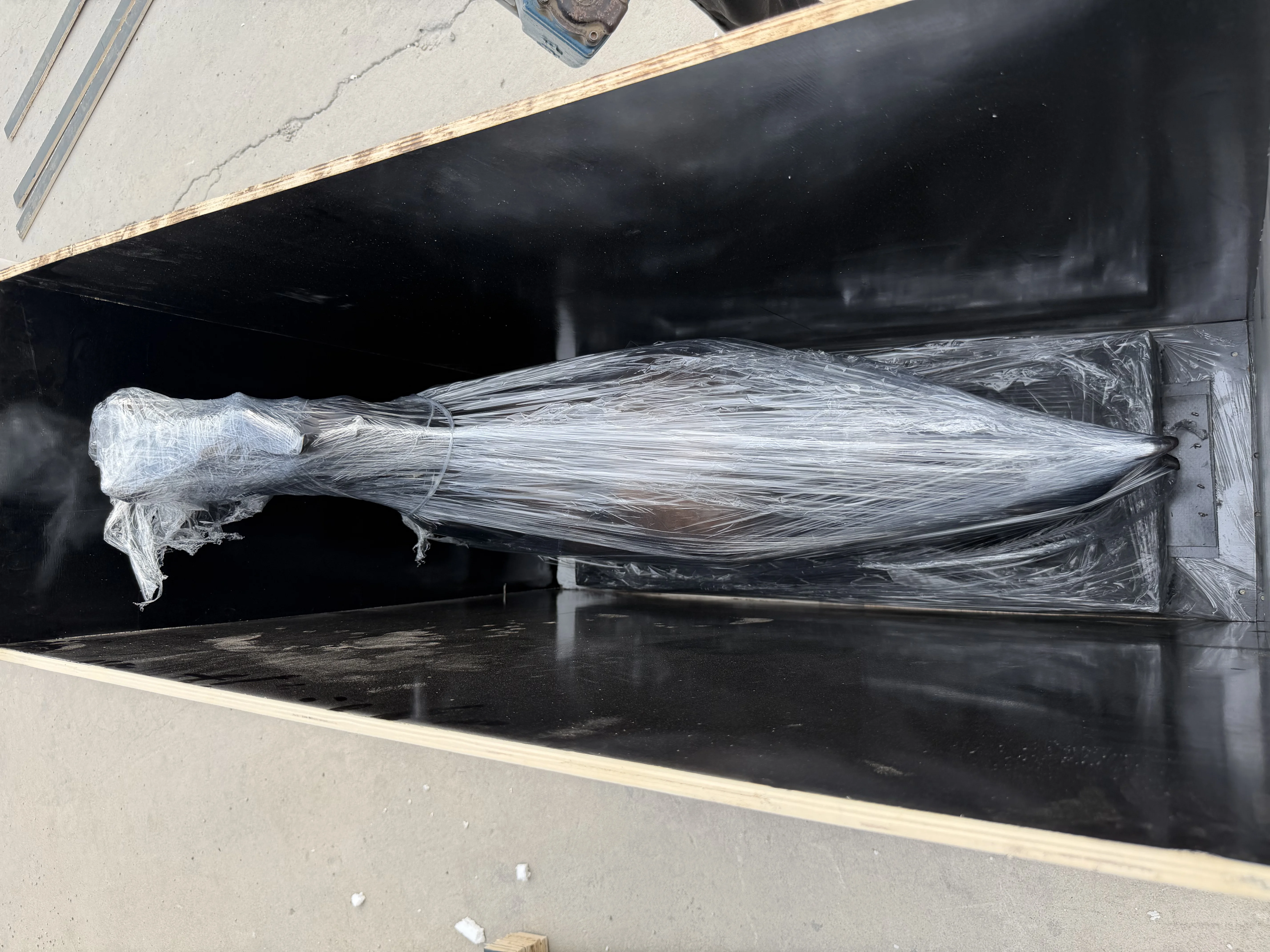 Top view of the bronze horse sculpture inside protective packing