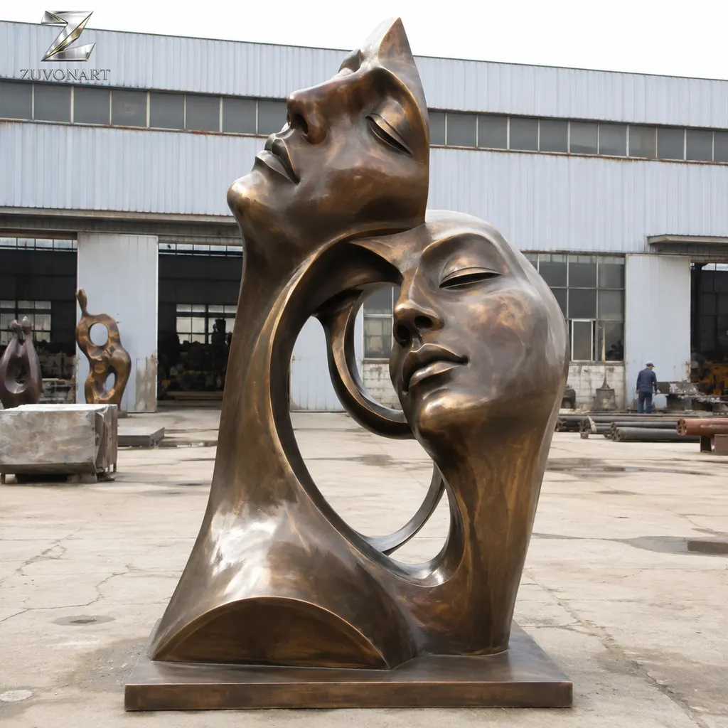 Two face-like forms meet in a compact dual-portrait composition.