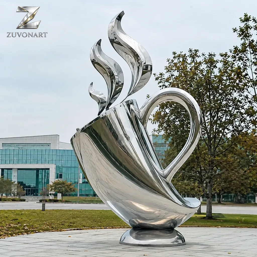 An oversized reflective cup is topped by an upward-curving steam-like element.