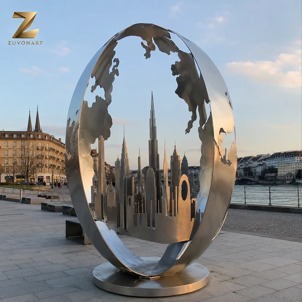 An open spherical form uses continent-shaped cutouts as its main visual motif.