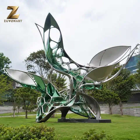 A cluster of pointed seed-like forms combines solid surfaces with openwork detailing.