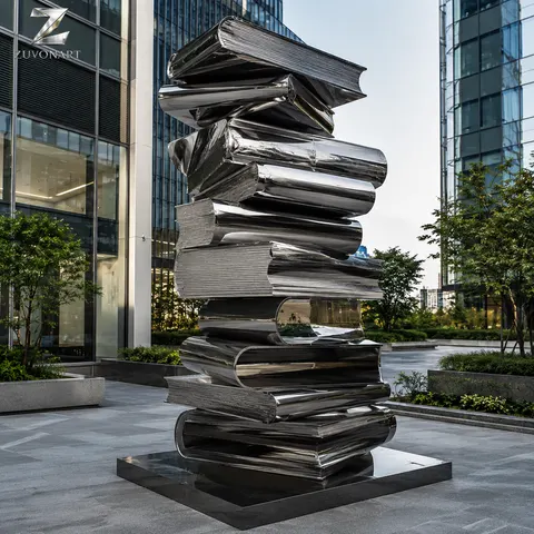 Folded reflective sheets build a layered, upward-reaching composition.